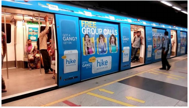 A vibrant TV and radio marketing campaign with a television, radio microphone, and newspaper in a creative layout