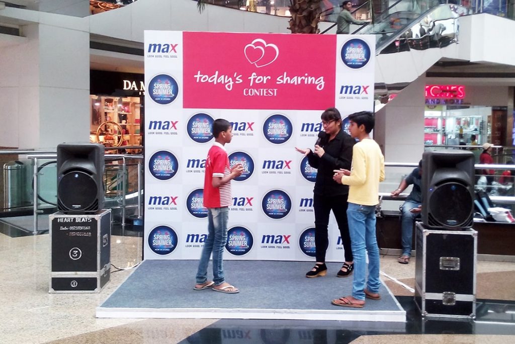 Mall activation with a large decorated cone and mall interior