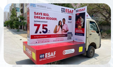 T Shape van branding with red and white design on side of van